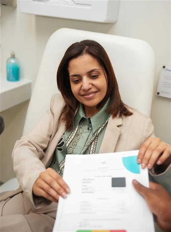 Doctor holding blood test paperwork